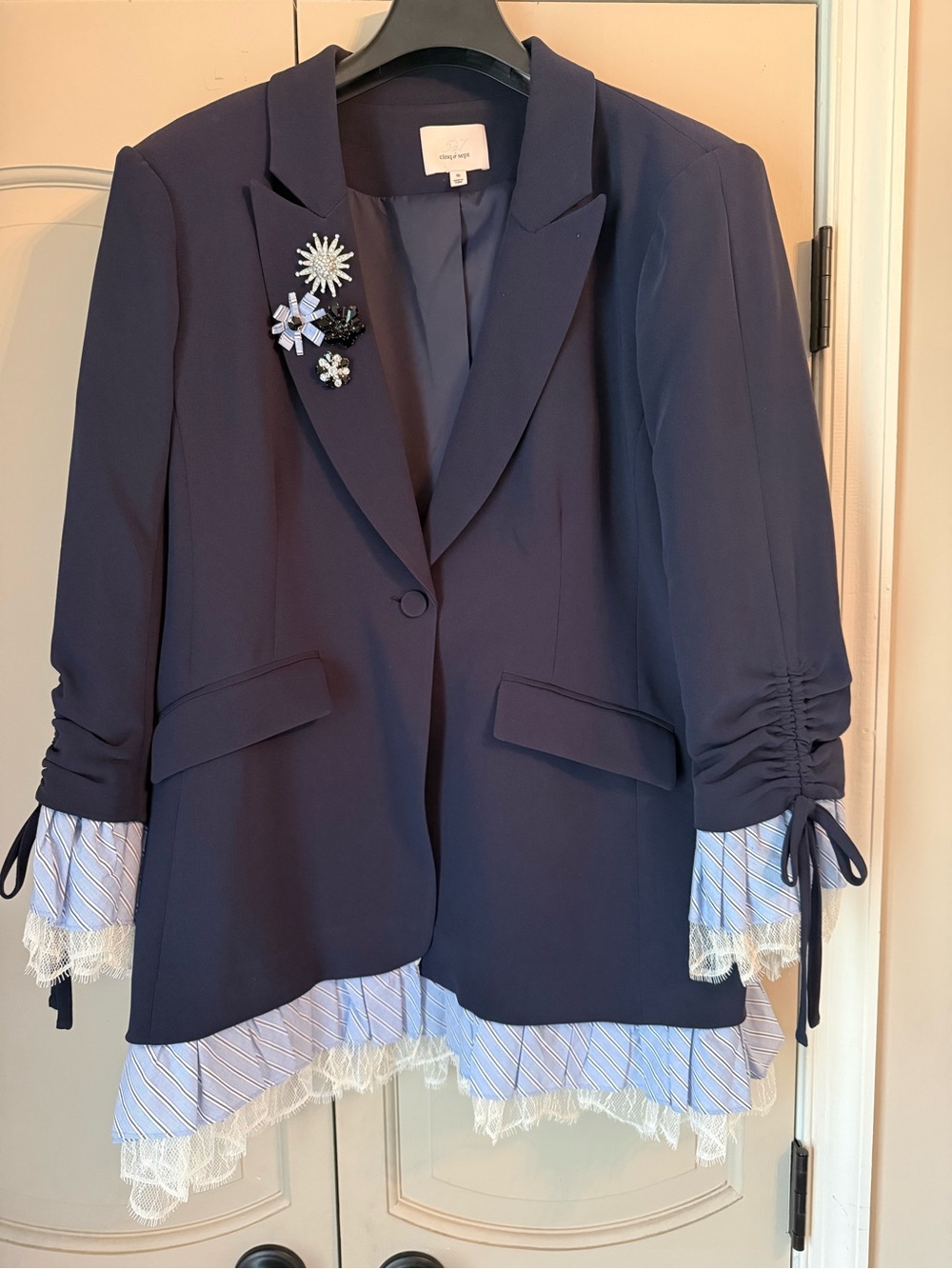 cinq a sept Roxie Navy Blazer with Striped Layered Hem and Floral Brooches